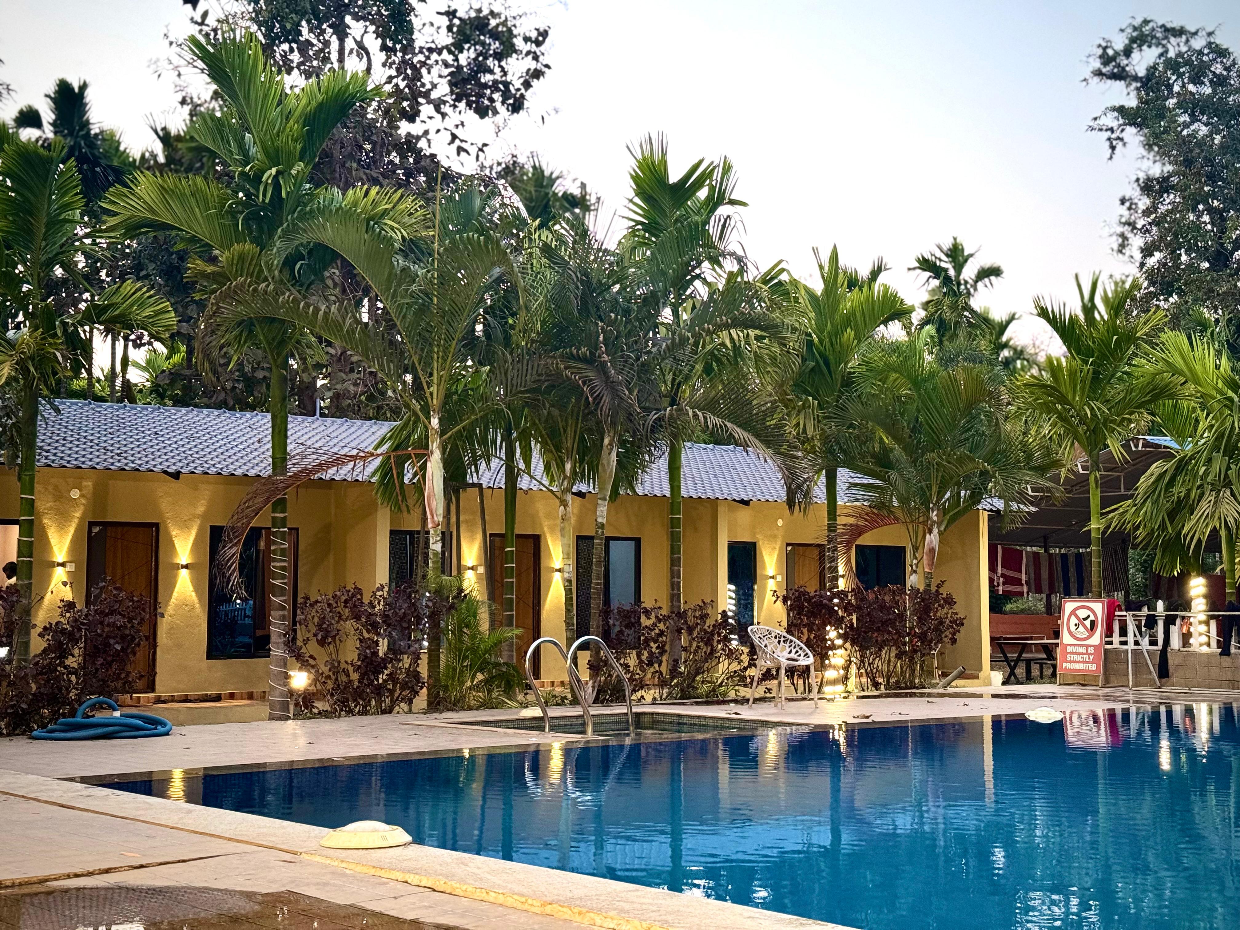 Taj Adventures Dandeli stay with pool and cottages