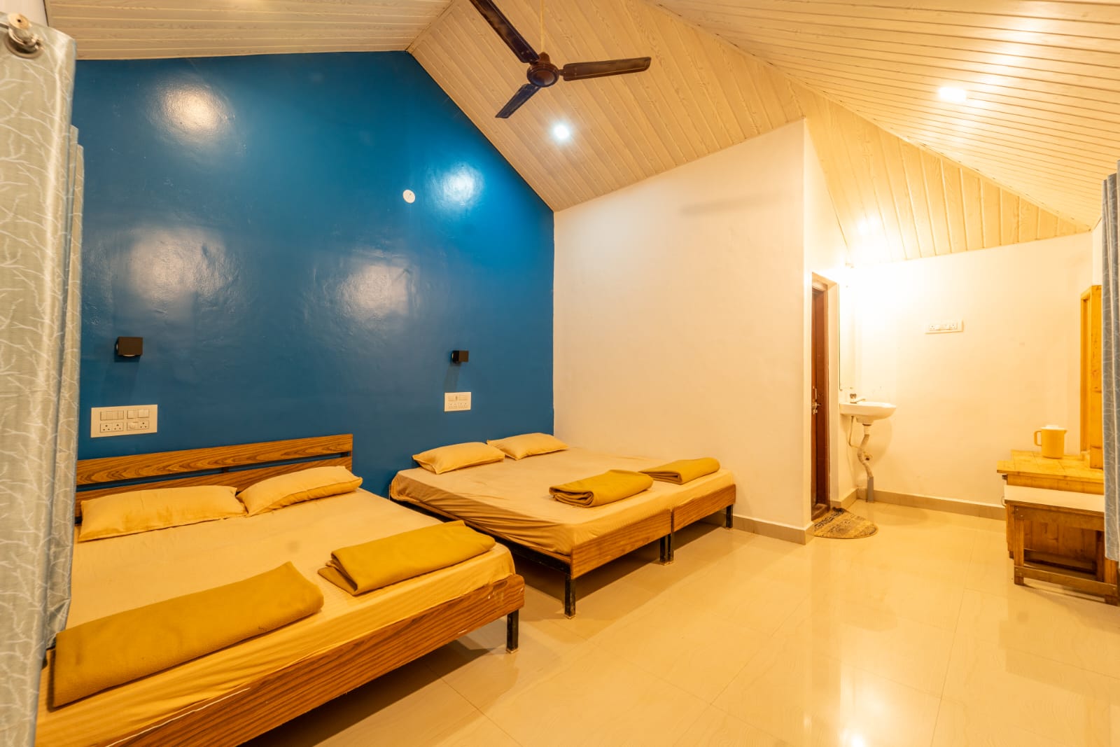 Blue wall room at Taj Adventures